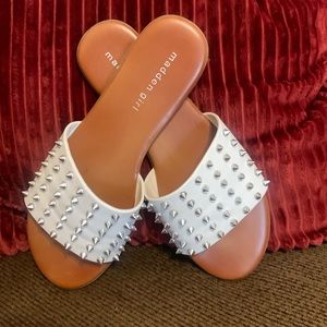 Gently used white spike detailed flat sandals